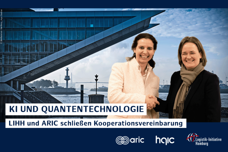 Marina Tcharnetsky und Carmen Schmidt auf einem Foto vor dem Dockland: KI und Quantentechnologie - LIHH und ARIC schließen Kooperationsvereinbarung